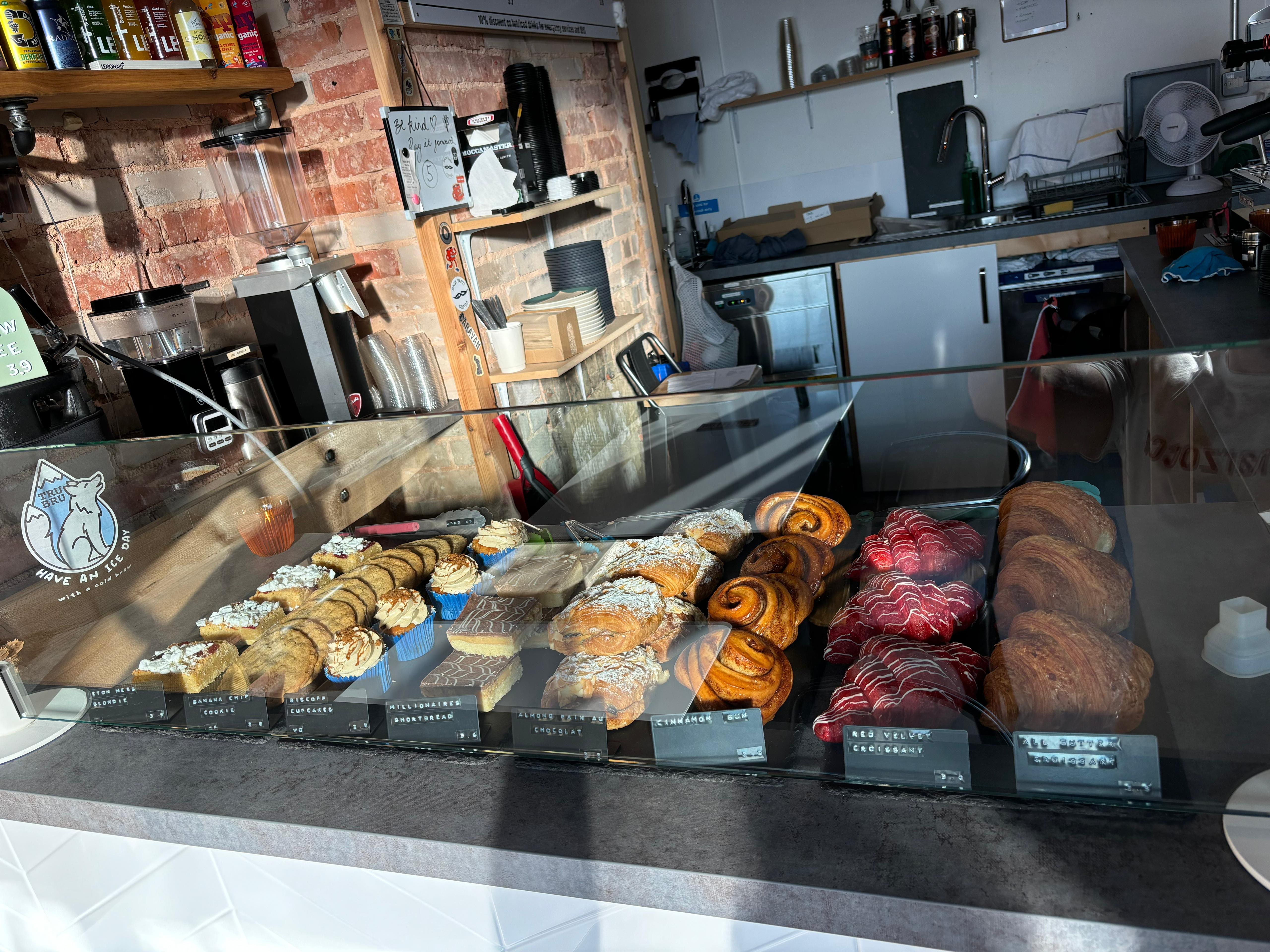 Cozy interior of Tamp & Grind Coffee Shop in Lancing